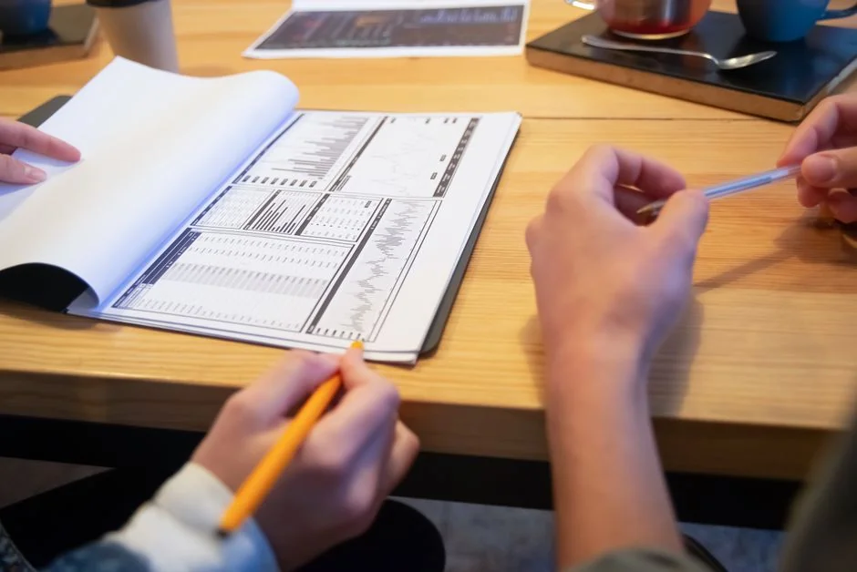 Open planner featuring a handwritten Hashtag Campaign note beside a keyboard. Ideal for social media and productivity themes.
